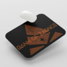 Black Mouse Pad with Bank of Zaonce logo in orange as mouse is on top