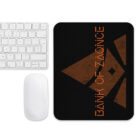 Black mousepad with Bank of Zaonce logo in orange next to keyboard and mouse